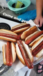 Served hot dogs to everyone!